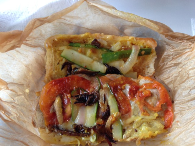 inside the cubano after it is grilled